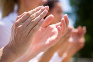 Applauding