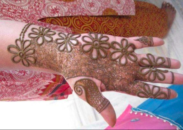 Bridal Mehandi Design with Unconventional Floral Motif