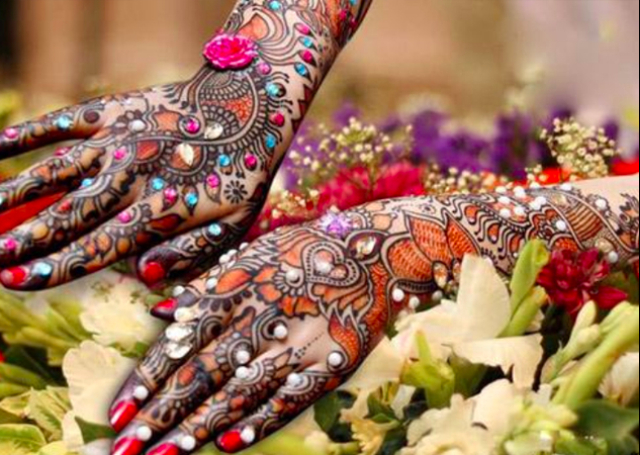 Bridal Mehandi Design with Flowers, Creepers and Colorful Stones