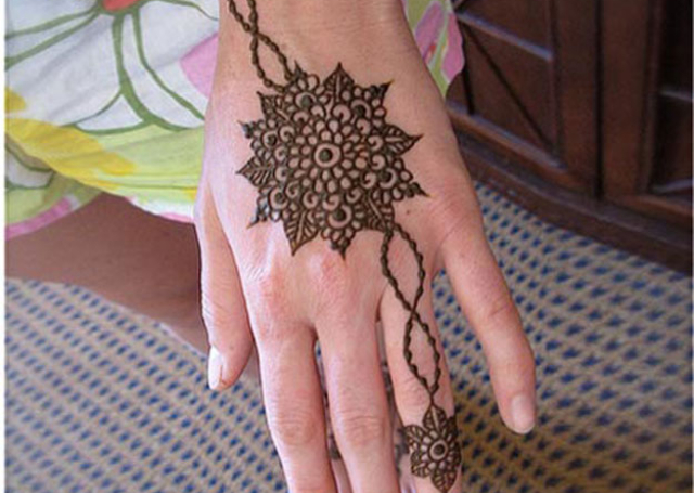Simple Mehandi Design with bold floral design 
