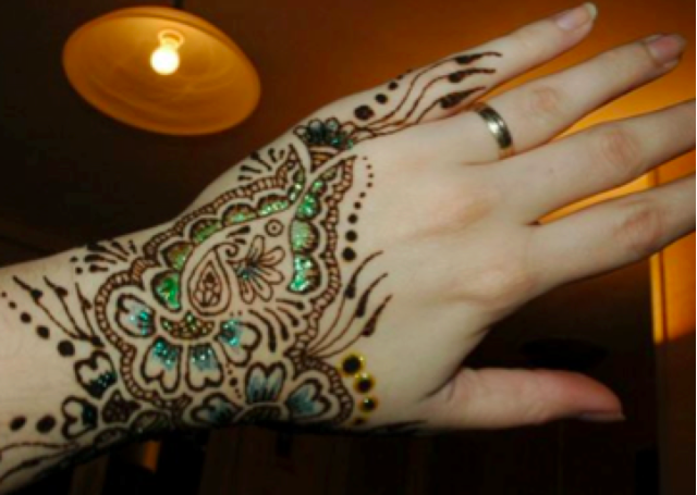 Floral mehendi with colourful embellishments