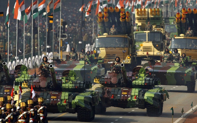 Indian army soldiers ride on T-72 tanks on Rajpath during the main Republic Day parade in New Delhi, Thursday, Jan. 26, 2012. India is marking it's 62nd Republic Day with military parades across the country. (AP Photo/Kevin Frayer)